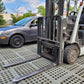 Mud Control Grids.  Can be used to create clean, mud free parking spaces for vehicles and equipment.  Keeps them clean and easily moved.  